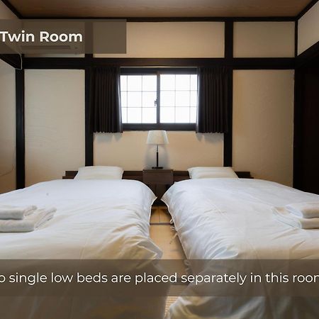 Buna Kusatsu Onsen Inn Bagian luar foto